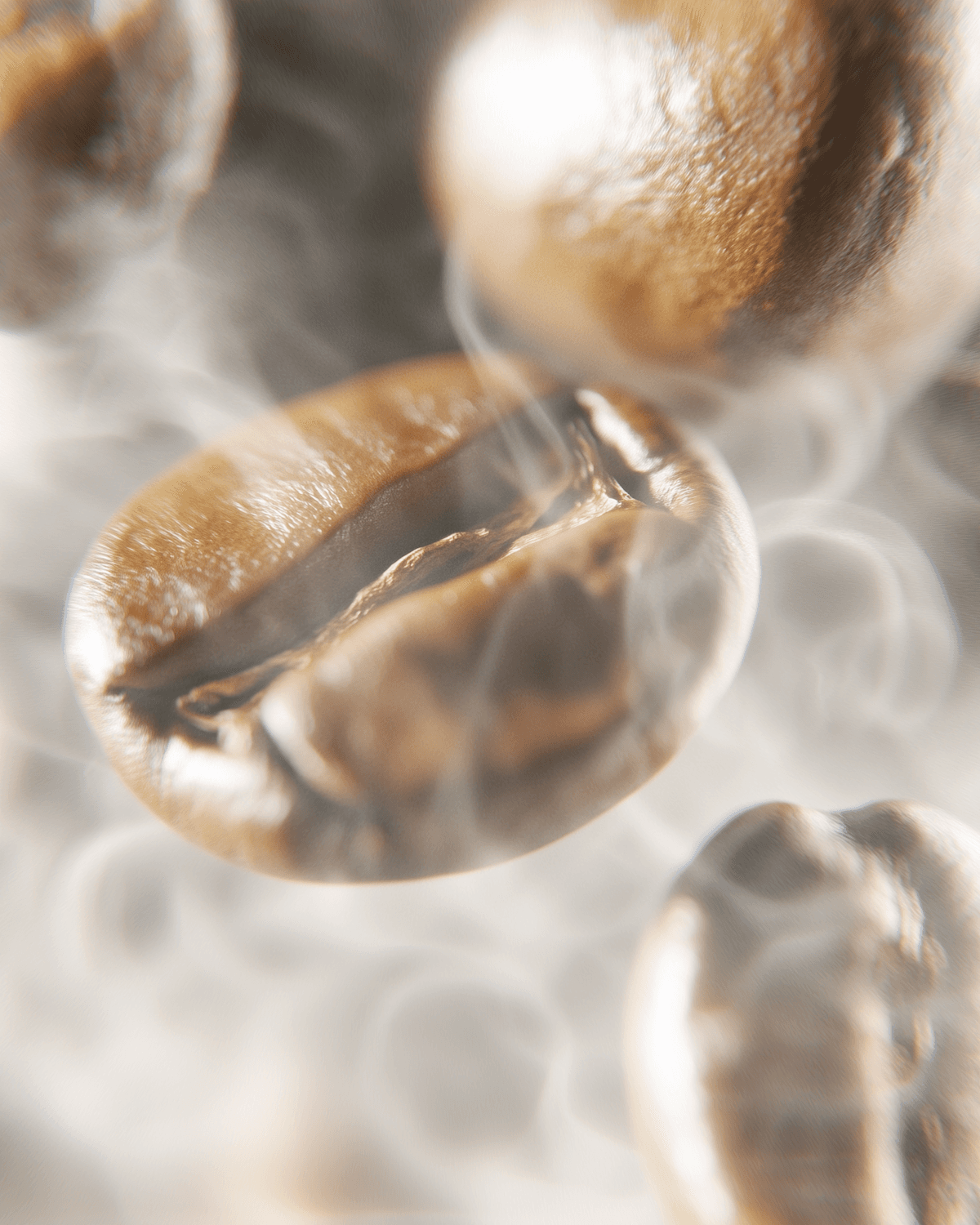 Close up of freshly roasted coffee beans with a wisp of steam